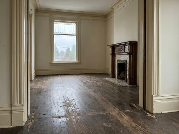 Fairhaven Victorian parlor with worn fir floor before refinishing