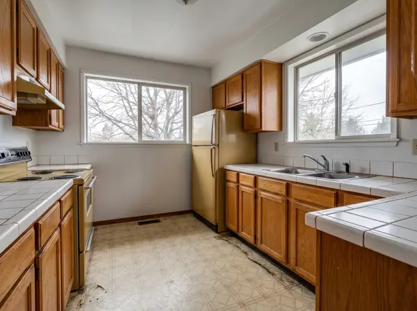 Roosevelt mid-century kitchen with vinyl tile before LVP install